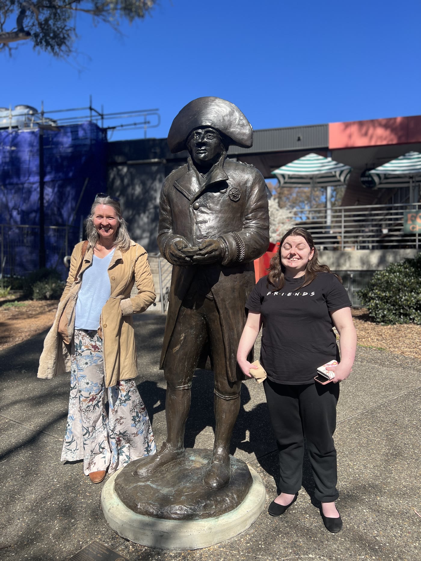 A Focus ACT participant and support worker enjoying an outing in Canberra